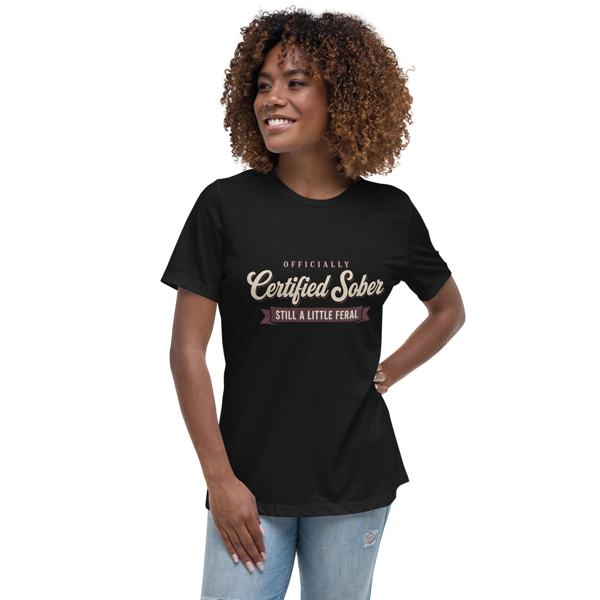Woman wearing the black Certified Sober, Still a Little Feral relaxed tee