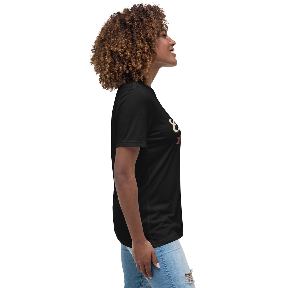 Woman wearing the black Certified Sober, Still a Little Feral relaxed tee, side view
