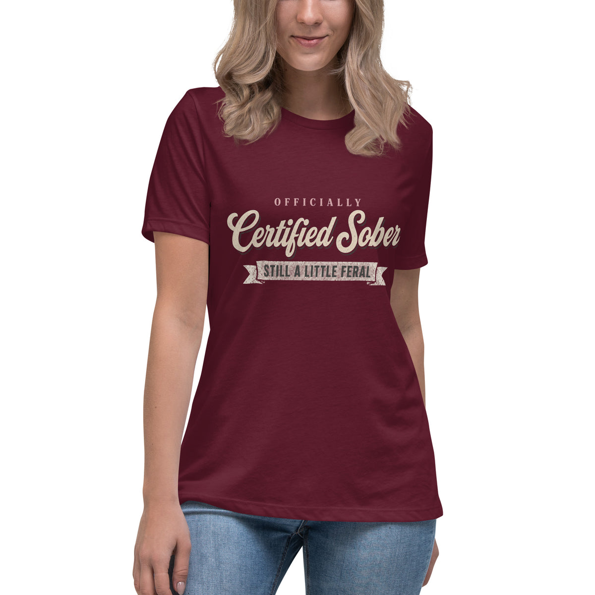 Woman wearing the maroon Certified Sober, Still a Little Feral relaxed tee