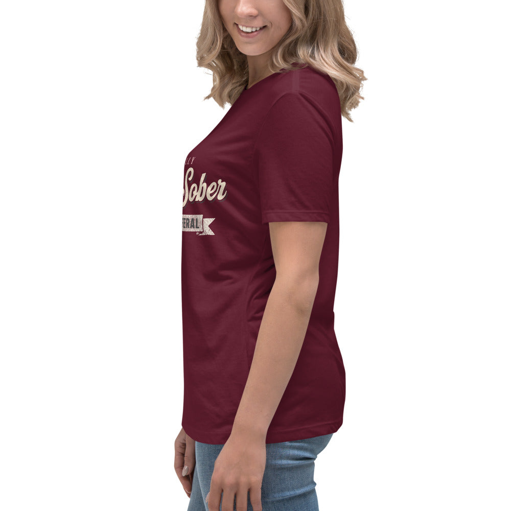 Woman wearing the maroon Certified Sober, Still a Little Feral relaxed tee, side view